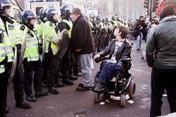 Protester discussing with police. Photo: Paul Hogan