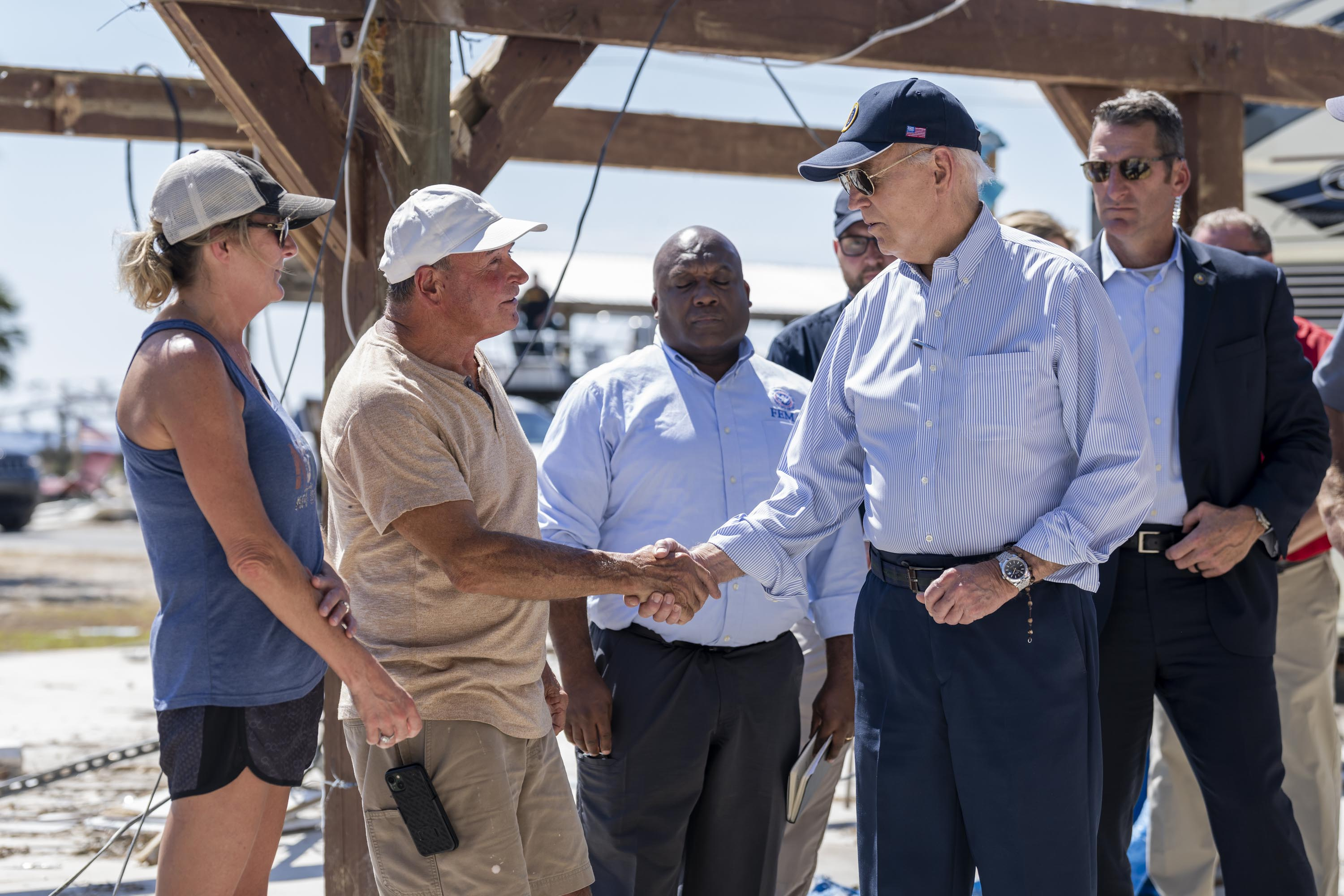 President Joe Biden meets with a family a surveys the damage of their home after Hurricane Helene, Thursday, October 3, 2024, in the Keaton Beach neighborhood in Perry, Florida.(Official White House Photo by Cameron Smith)